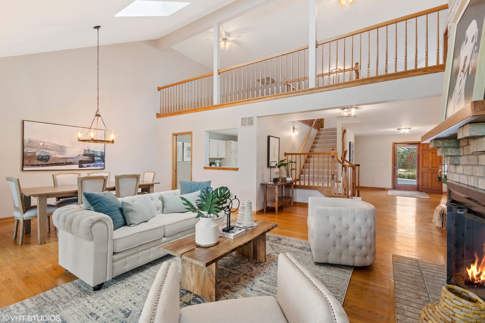 714 Natwill Square Geneva, IL 60134 - Photo 10 of 27 a living room with furniture and a large window