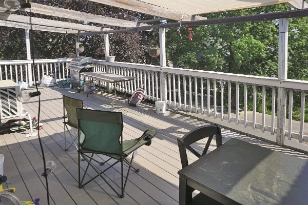 159 Brown Street, Unit 3 Waltham, MA 02453 - Photo 9 of 10 a view of a balcony with furniture