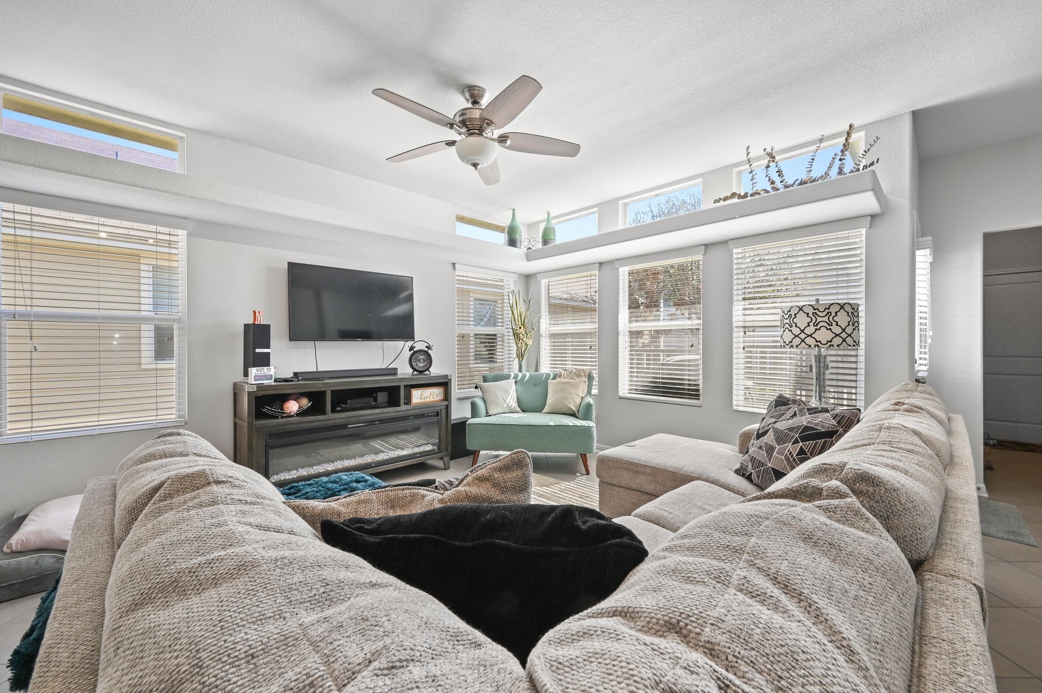 1480 Sanders Kyle, TX 78640 - Photo 12 of 27 Generous windows that infuse the main living area with natural light.