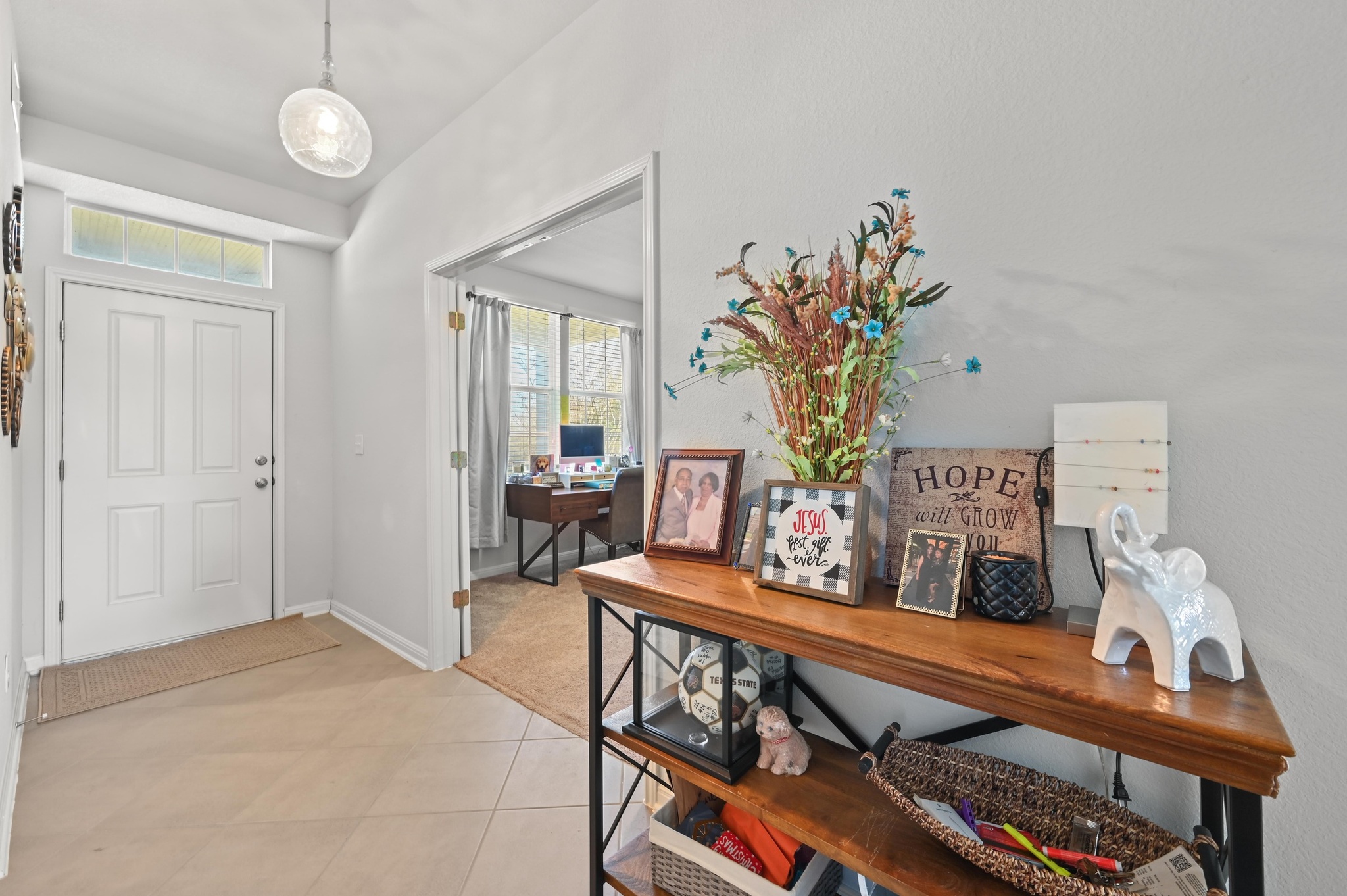 1480 Sanders Kyle, TX 78640 - Photo 16 of 27 In addition to 3 bedrooms, there is also a home office with French doors off the entry foyer.