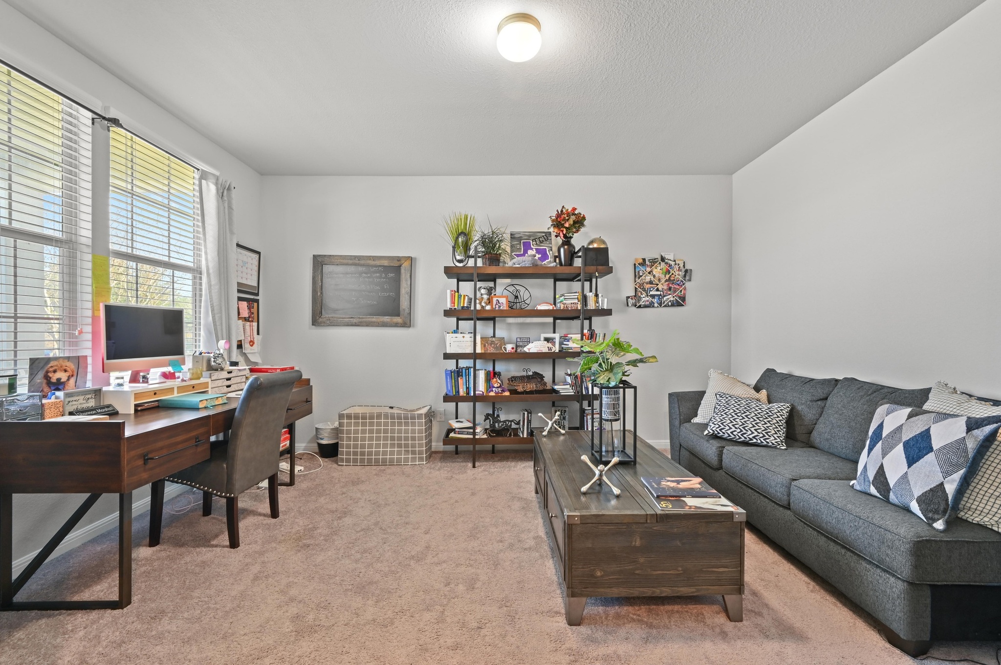 1480 Sanders Kyle, TX 78640 - Photo 17 of 27 The home office is a spacious retreat with serene golf course views ideal for the remote worker.