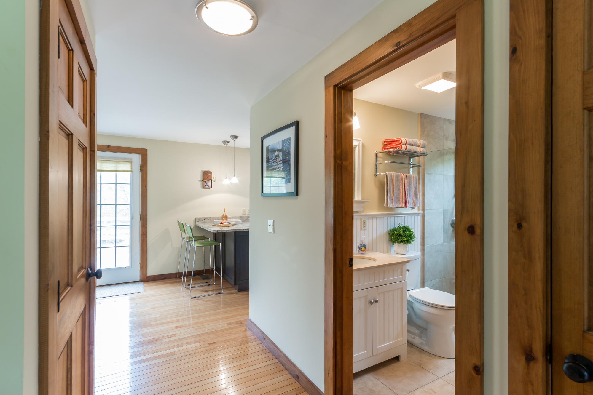 23 Schoolhouse Road Edgartown, MA 02539 - Photo 8 of 35 a bathroom with a toilet a sink and mirror