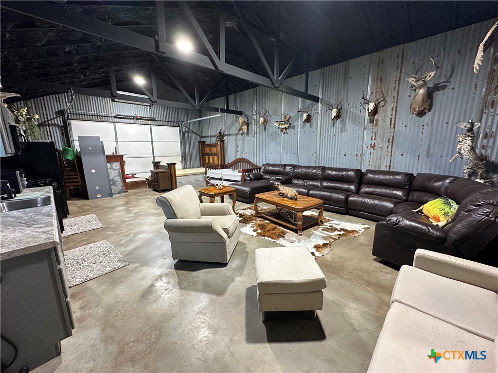 A Juan Antonio Road Victoria, TX 77904 - Photo 6 of 14 a living room with furniture and a chandelier