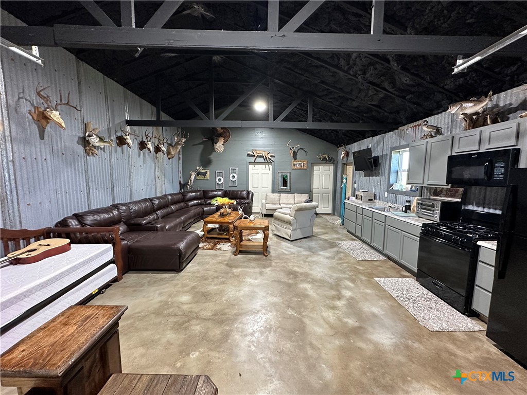 A Juan Antonio Road Victoria, TX 77904 - Photo 7 of 14 a kitchen with furniture and a stove