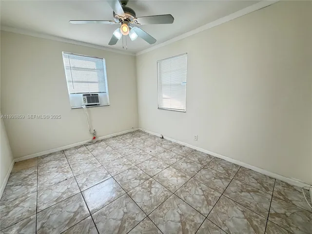 en empty room with windows