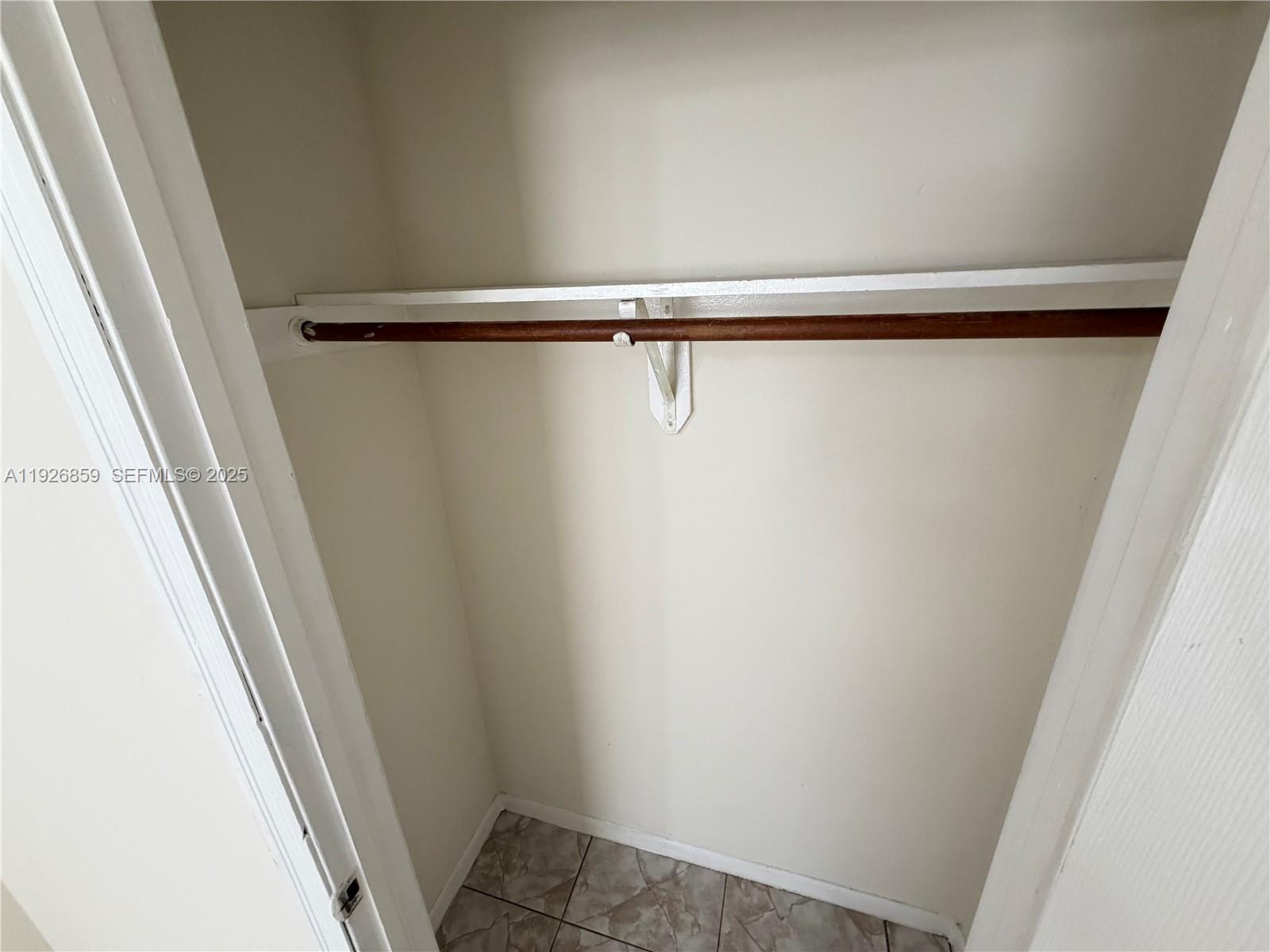 4801 Southwest 18th Street, Unit 3 West Park, FL 33023 - Photo 19 of 22 a view of closet with wooden floor
