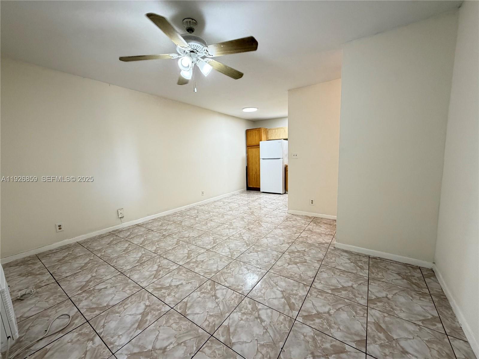 4801 Southwest 18th Street, Unit 3 West Park, FL 33023 - Photo 2 of 22 a view of an empty room and window