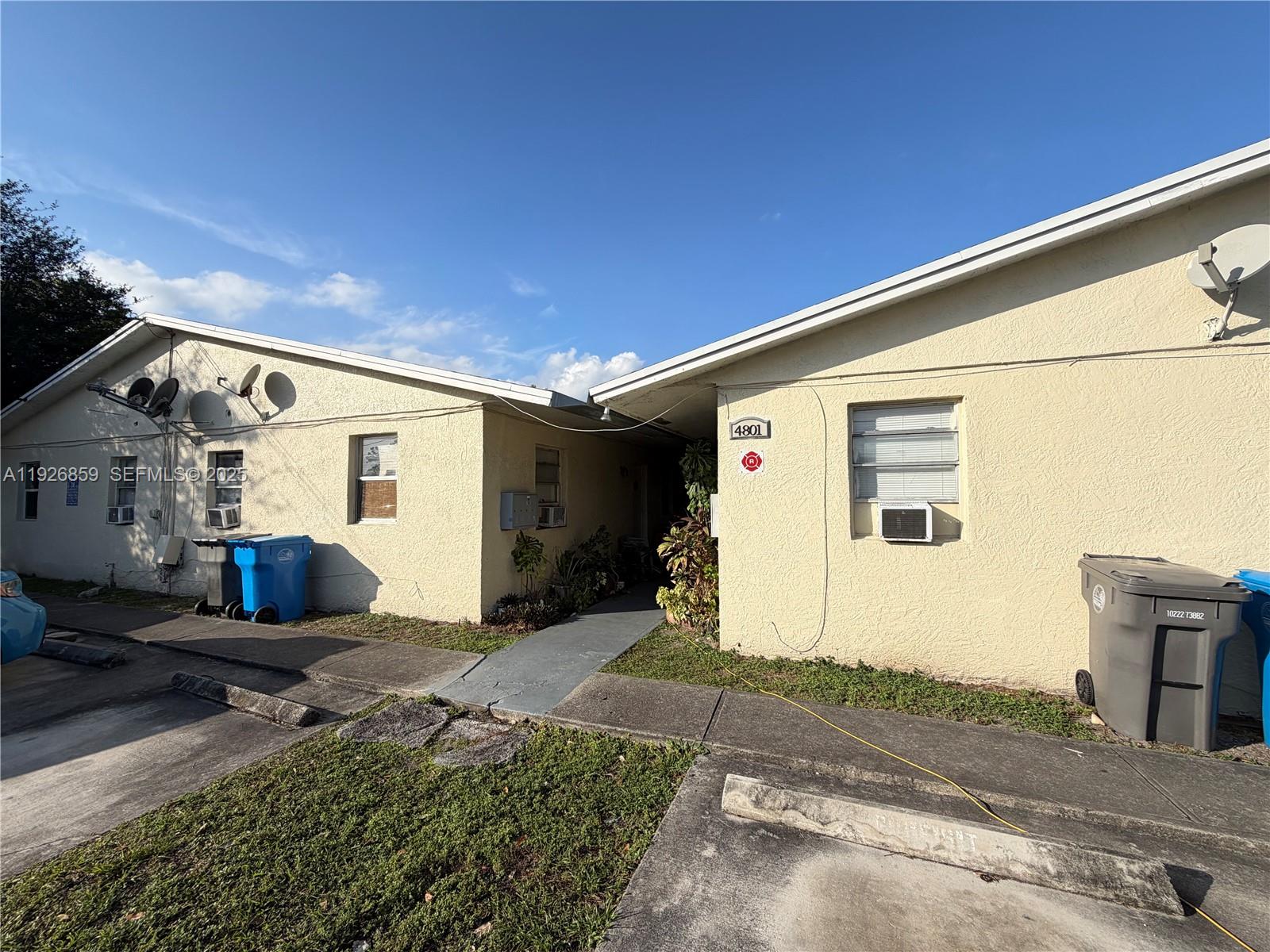 4801 Southwest 18th Street, Unit 3 West Park, FL 33023 - Photo 22 of 22 a front view of a house with garden