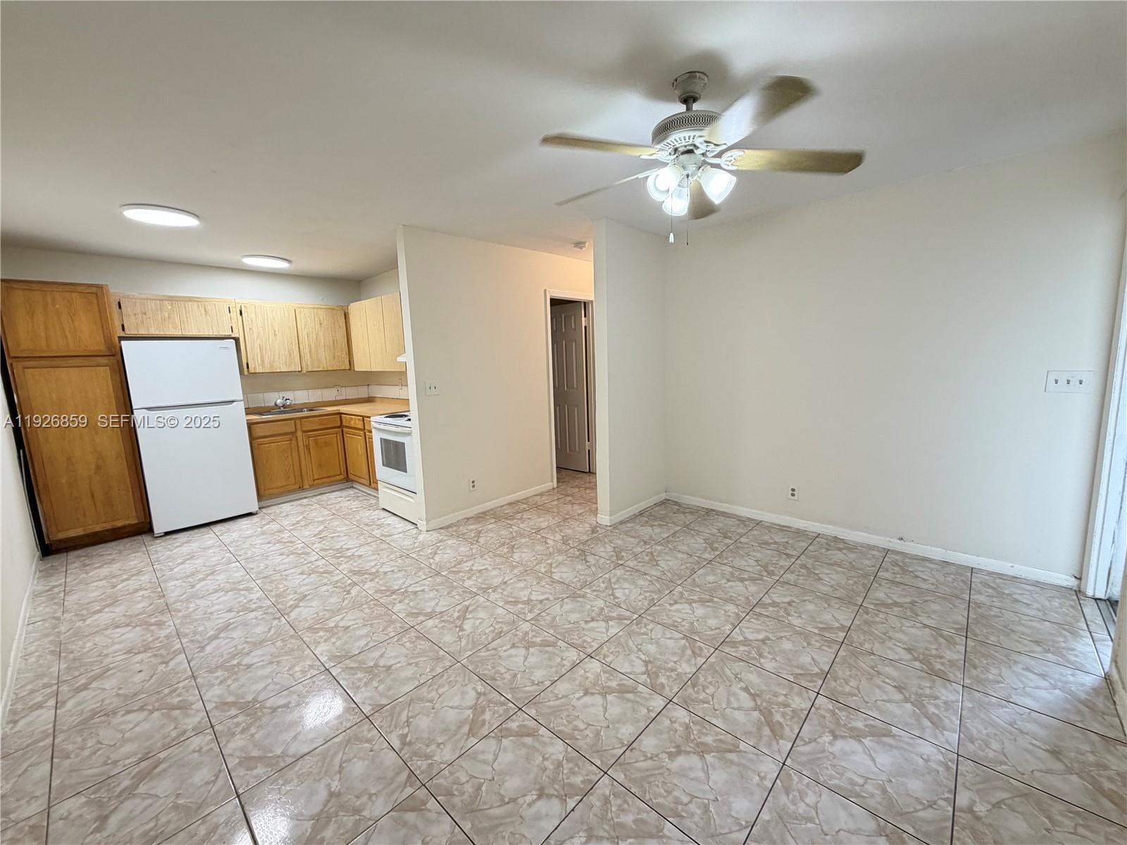 4801 Southwest 18th Street, Unit 3 West Park, FL 33023 - Photo 6 of 22 a view of a kitchen with a sink