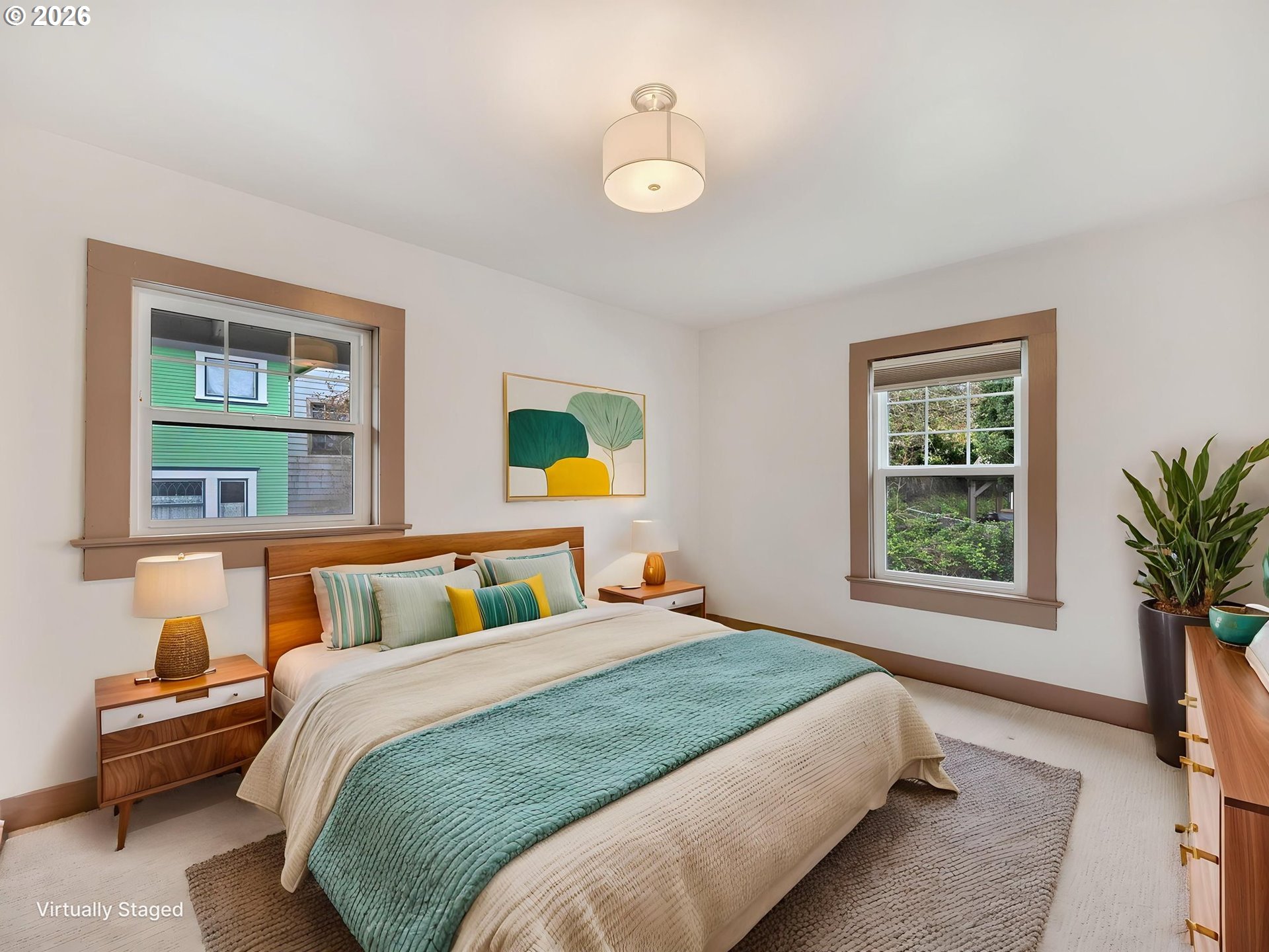 933 8th Street Astoria, OR 97103 - Photo 19 of 31 a bedroom with a bed and window