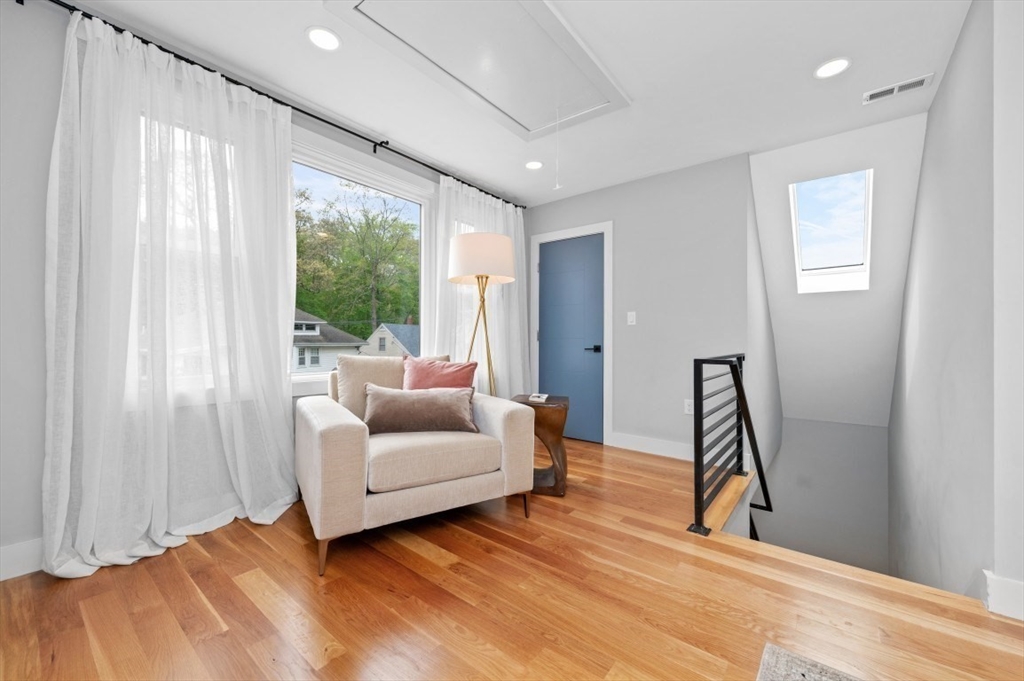 61 Paul Revere Road, Unit 2 Arlington, MA 02476 - Photo 20 of 33 a living room with furniture and a window