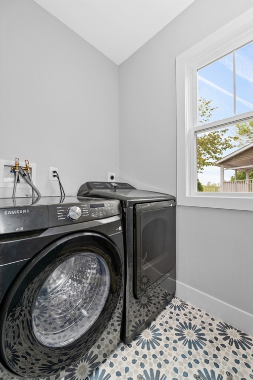 61 Paul Revere Road, Unit 2 Arlington, MA 02476 - Photo 29 of 33 a utility room with a sink