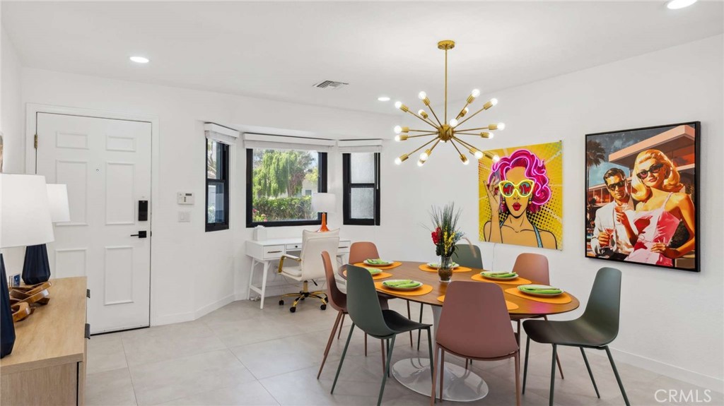 2004 East Nicola Road Palm Springs, CA 92262 - Photo 19 of 40 a dining room with furniture and window