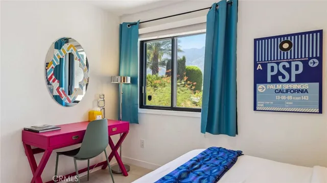 a street sign that is sitting on a brick wall