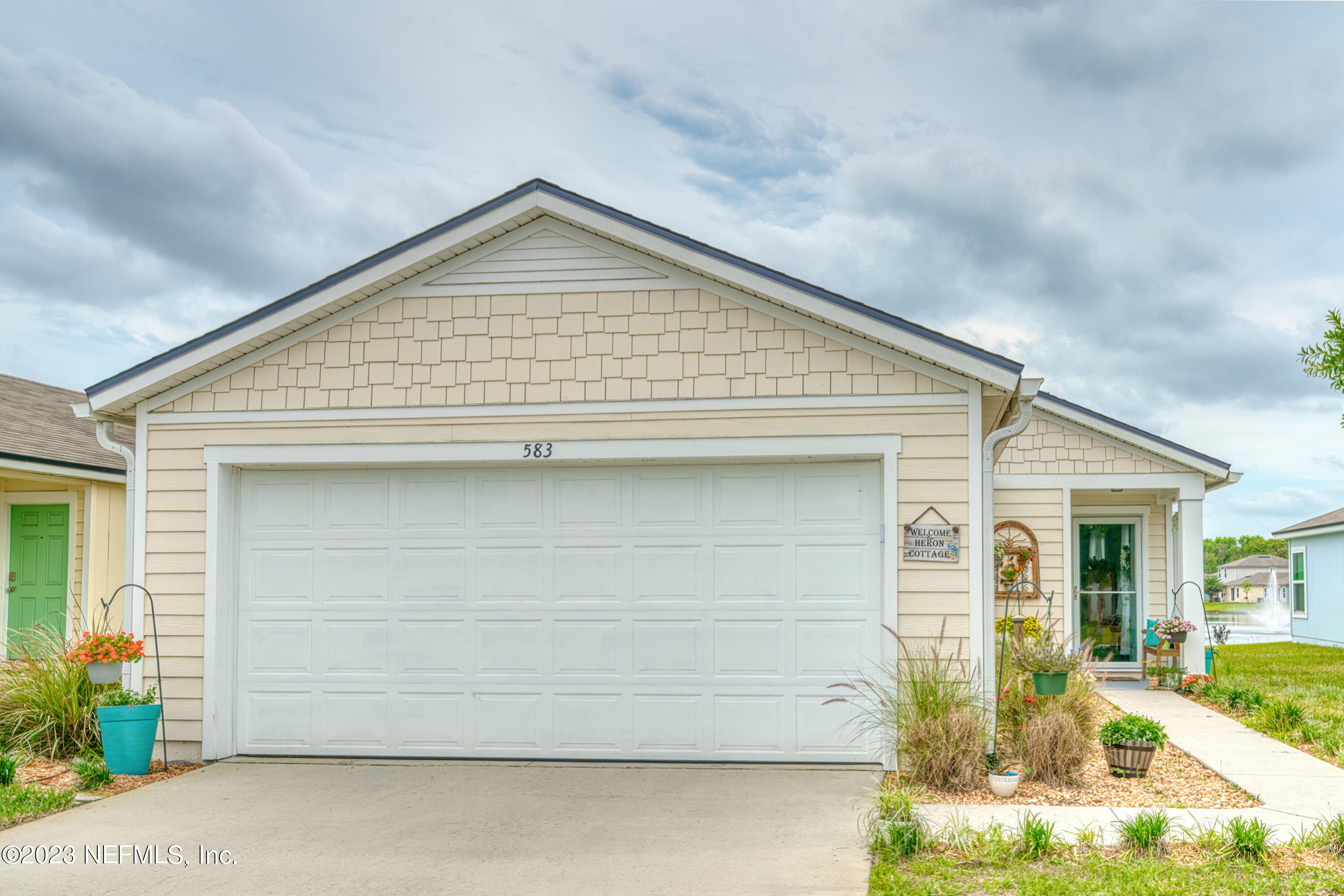 583 Ashby Landing Way St. Augustine, FL 32086 - Photo 2 of 48 a view of house with garage