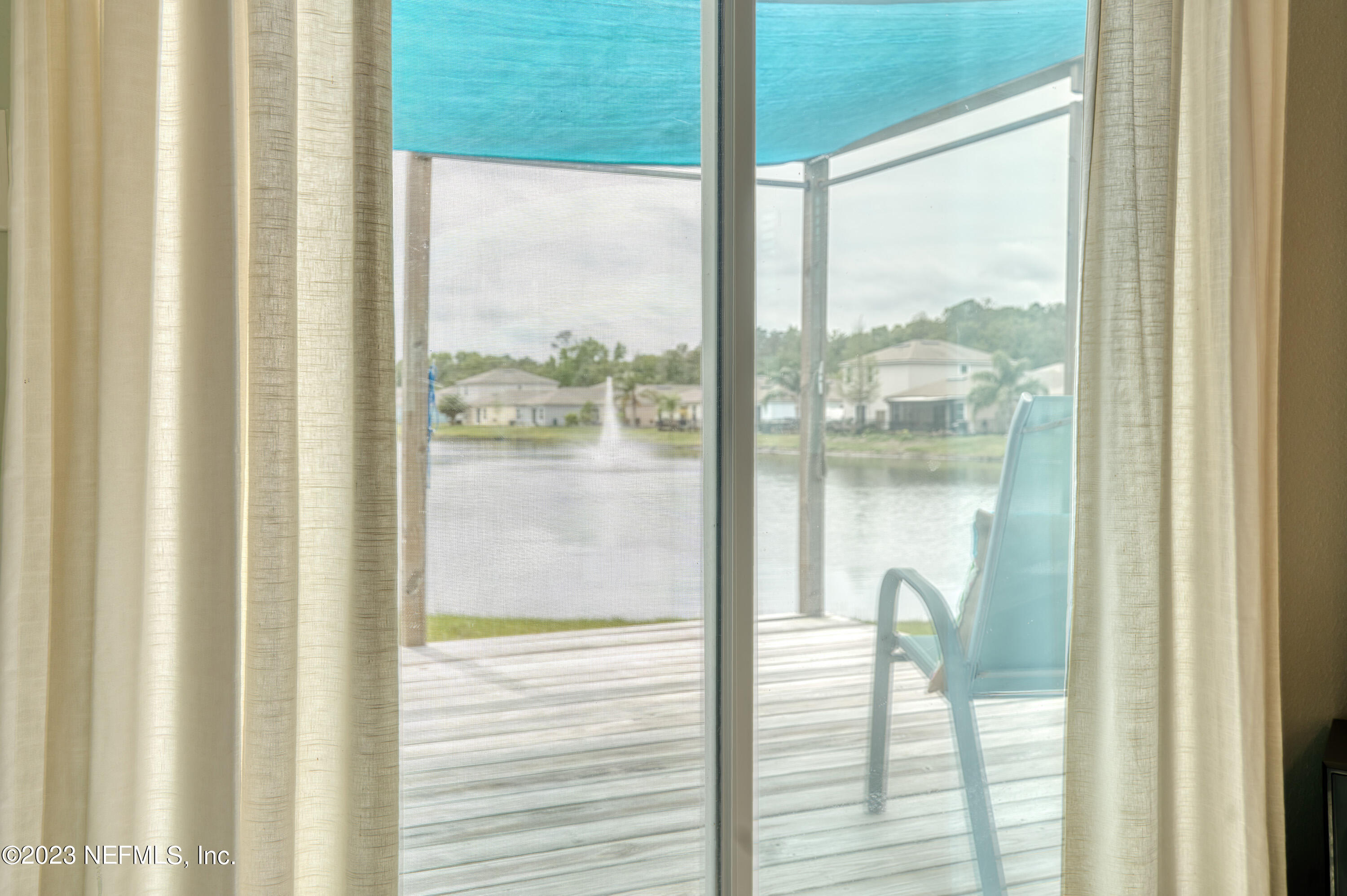 583 Ashby Landing Way St. Augustine, FL 32086 - Photo 29 of 48 a window with yard from balcony