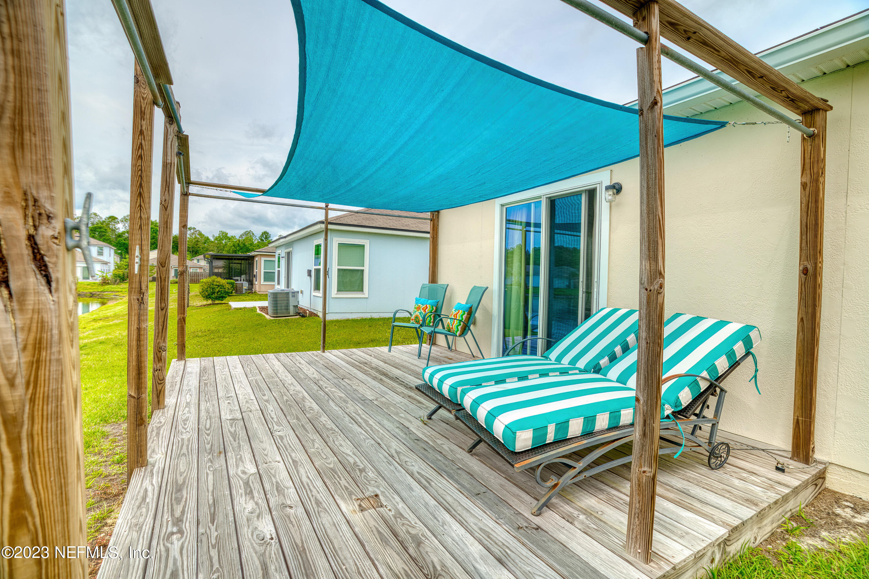 583 Ashby Landing Way St. Augustine, FL 32086 - Photo 32 of 48 a house view with a garden space