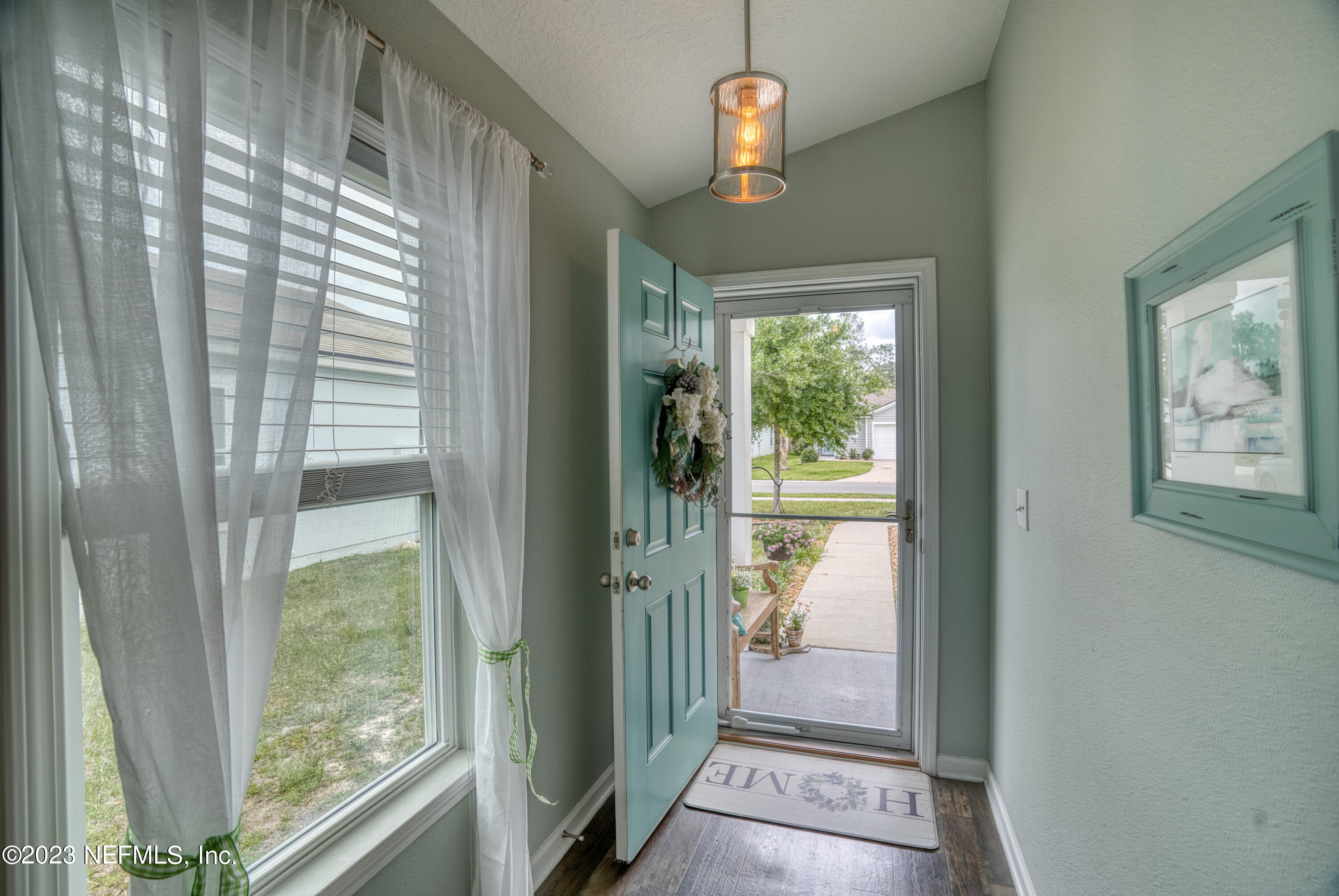 583 Ashby Landing Way St. Augustine, FL 32086 - Photo 5 of 48 a view of a glass door and porch