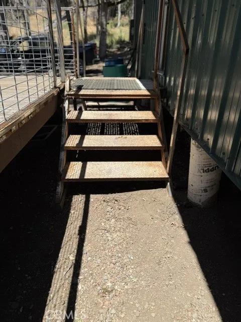 24 North 35 Road Paskenta, CA 96074 - Photo 19 of 41 Steel stairs & landing between deck & cabin