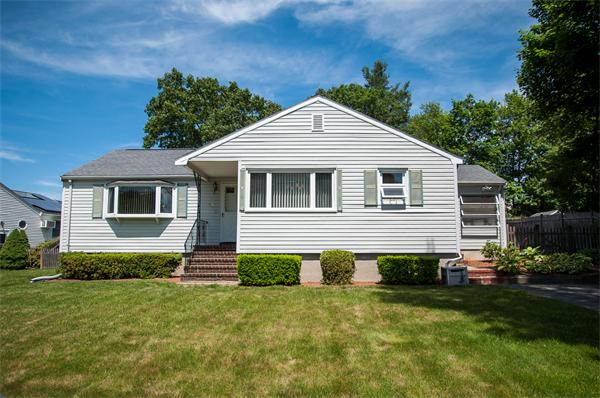 19 Carroll Road Woburn, MA 01801 - Photo 1 of 12 a front view of a house with a yard