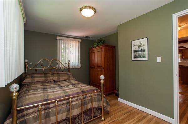 19 Carroll Road Woburn, MA 01801 - Photo 8 of 12 a bedroom with a bed and a window