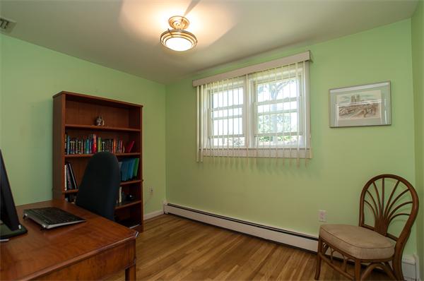 19 Carroll Road Woburn, MA 01801 - Photo 9 of 12 a view of a livingroom with furniture and a window