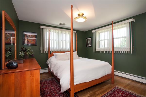 19 Carroll Road Woburn, MA 01801 - Photo 10 of 12 a bedroom with bed and window