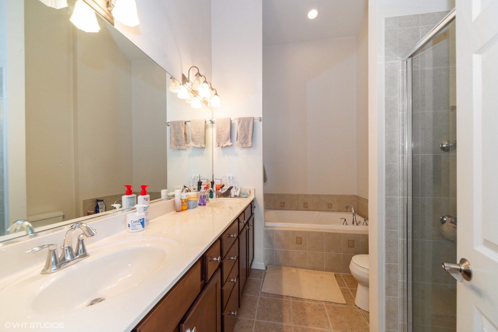 563 George Street Wood Dale, IL 60191 - Photo 11 of 15 a bathroom with a sink vanity granite tub and shower