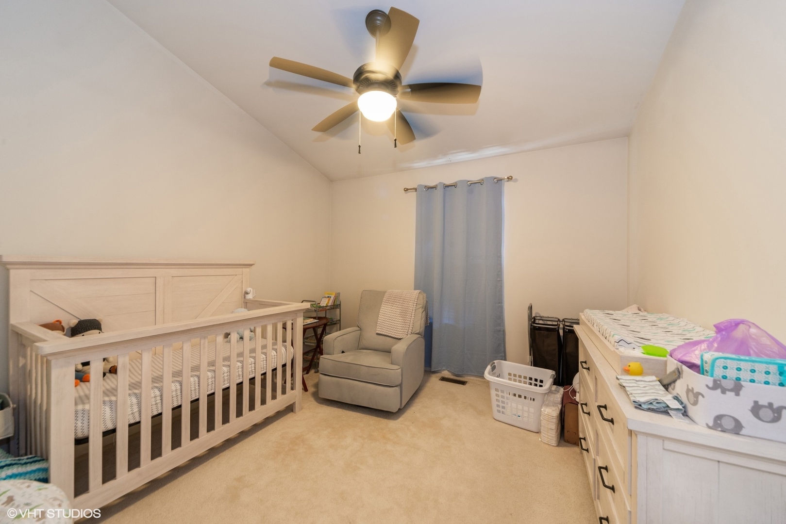 563 George Street Wood Dale, IL 60191 - Photo 13 of 15 a bedroom with furniture and a chandelier fan