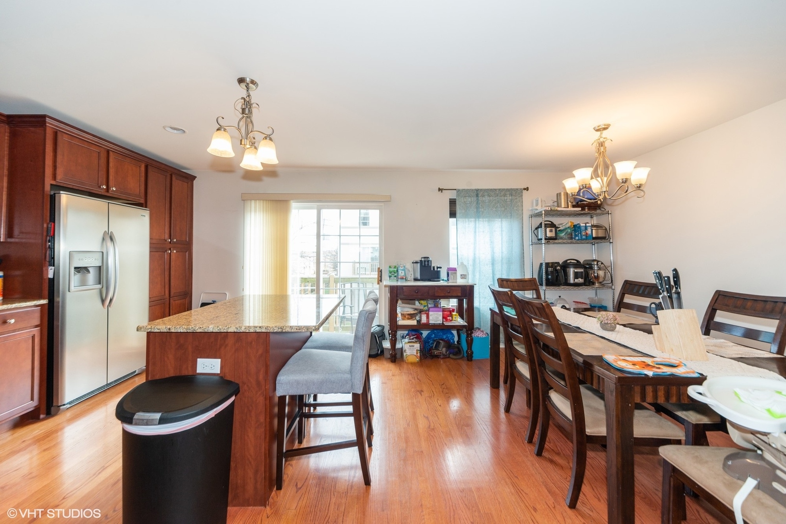 563 George Street Wood Dale, IL 60191 - Photo 6 of 15 a view of a dining room with furniture window and wooden floor