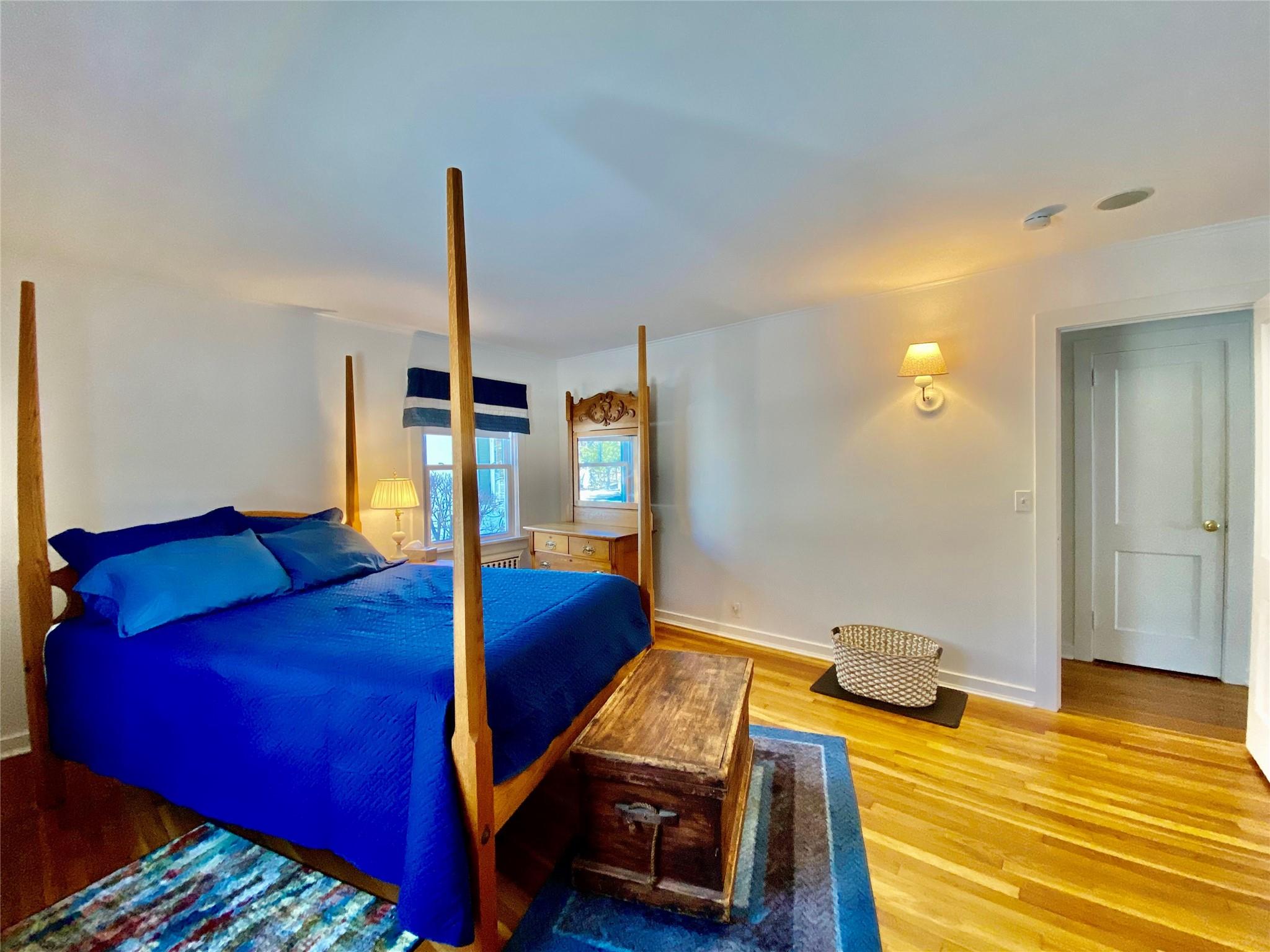 3825 South Harbor Road Southold, NY 11971 - Photo 9 of 15 Bedroom 1 with light wood-type flooring and baseboards