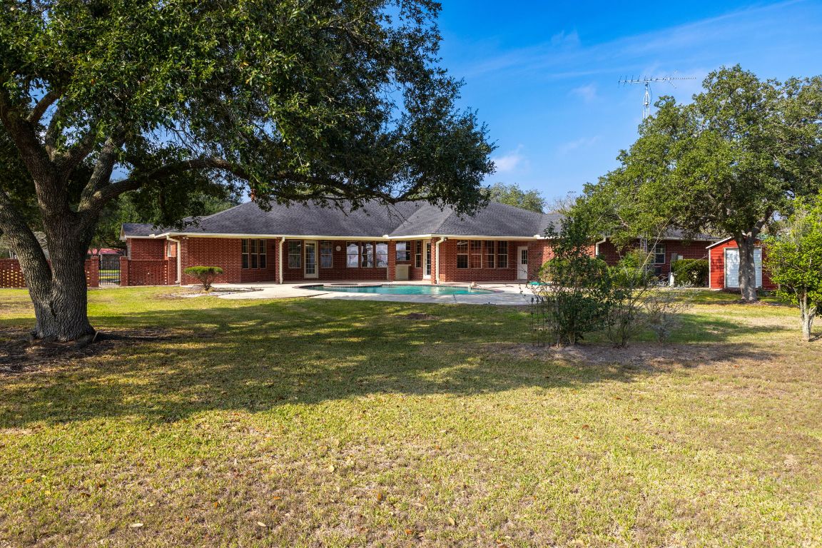 803 South Converse Street Flatonia, TX 78941 - Photo 32 of 35 a view of a house with a swimming pool