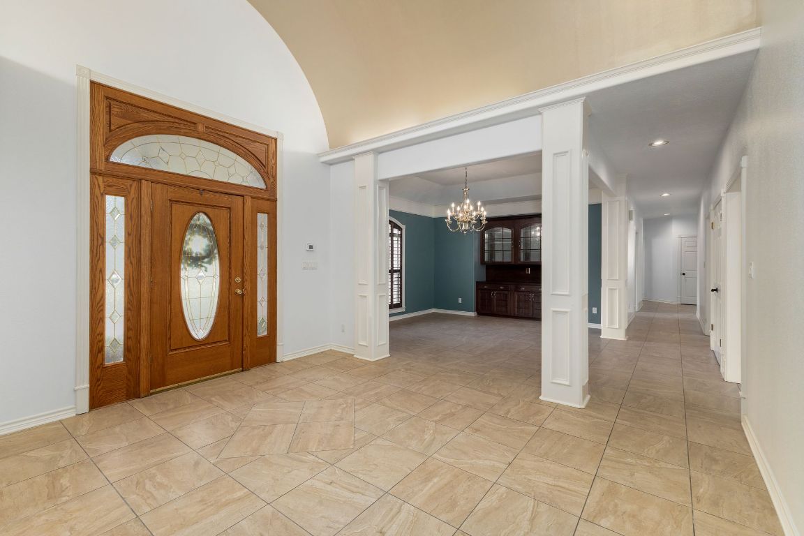 803 South Converse Street Flatonia, TX 78941 - Photo 5 of 35 a view of a room with large mirror and cabinets