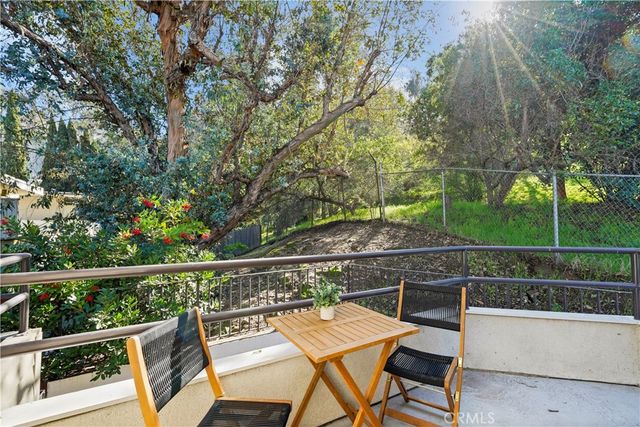 a balcony with a couch