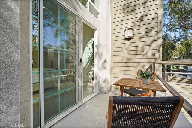 a balcony with a couch