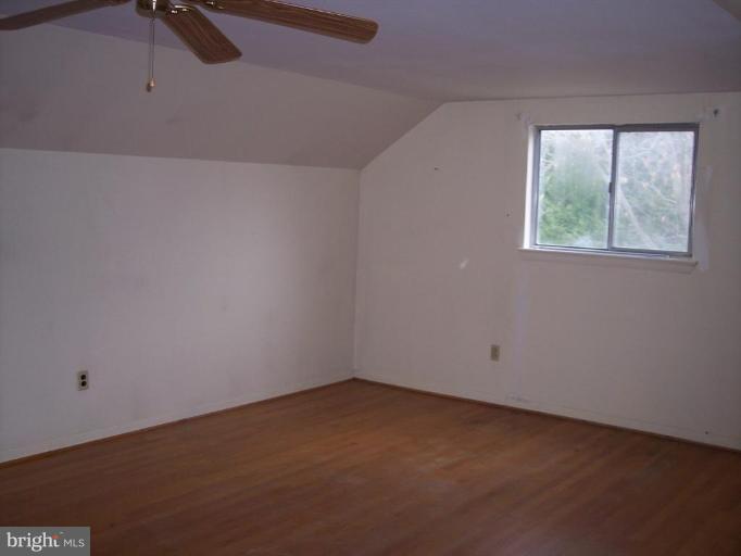 115 Ashton Road Ashton, MD 20861 - Photo 19 of 25 an empty room with a window