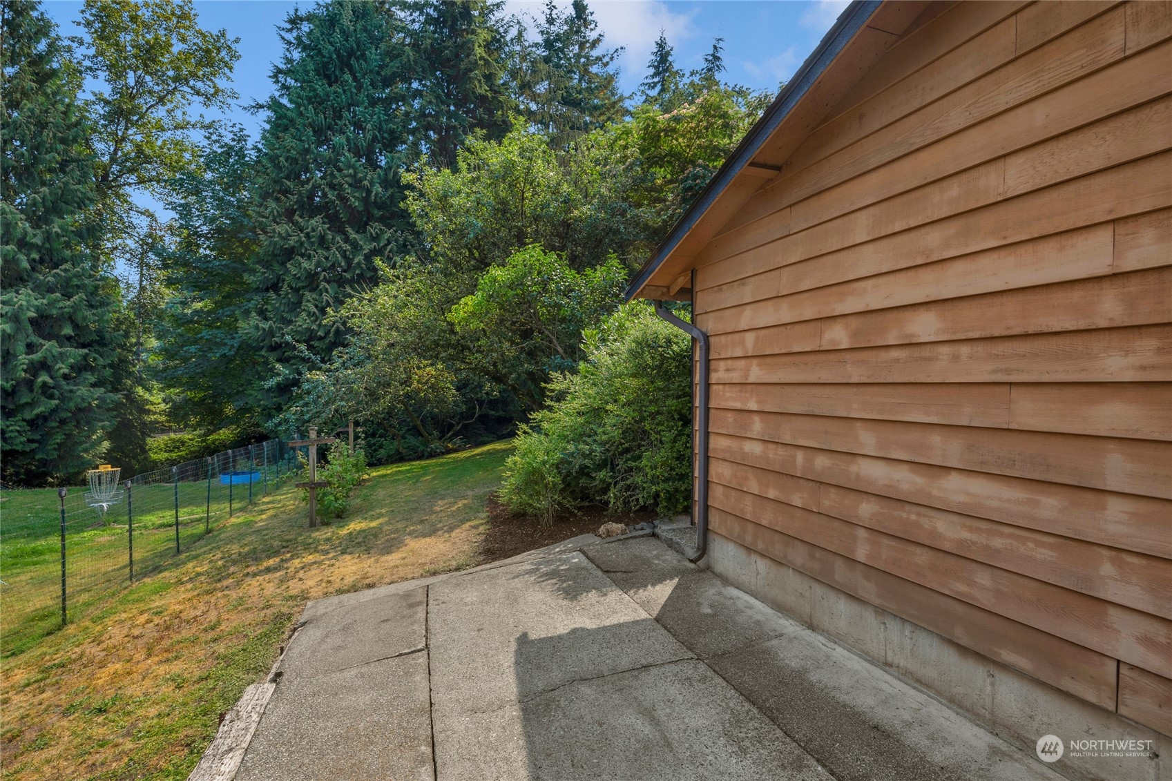 5616 227th Street Southeast Bothell, WA 98021 - Photo 16 of 38 a view of backyard with green space