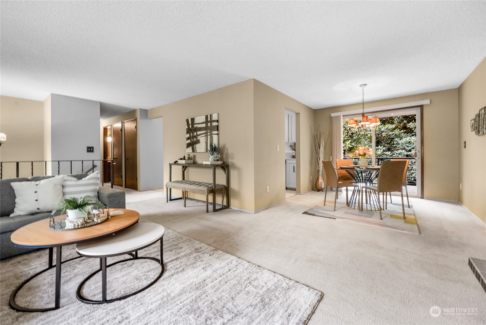 5616 227th Street Southeast Bothell, WA 98021 - Photo 19 of 38 a living room with furniture and a table