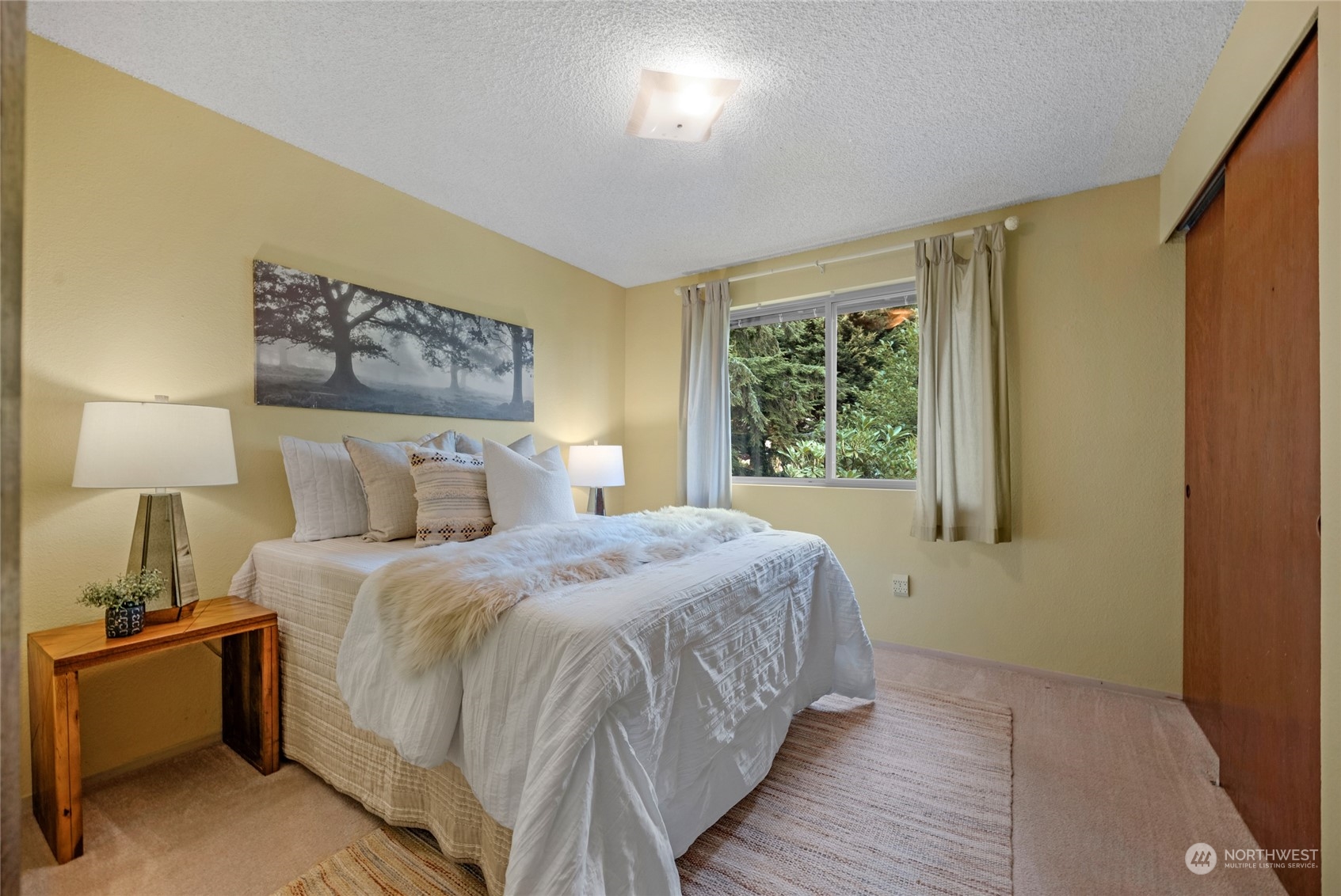 5616 227th Street Southeast Bothell, WA 98021 - Photo 27 of 38 a bedroom with a bed and a window