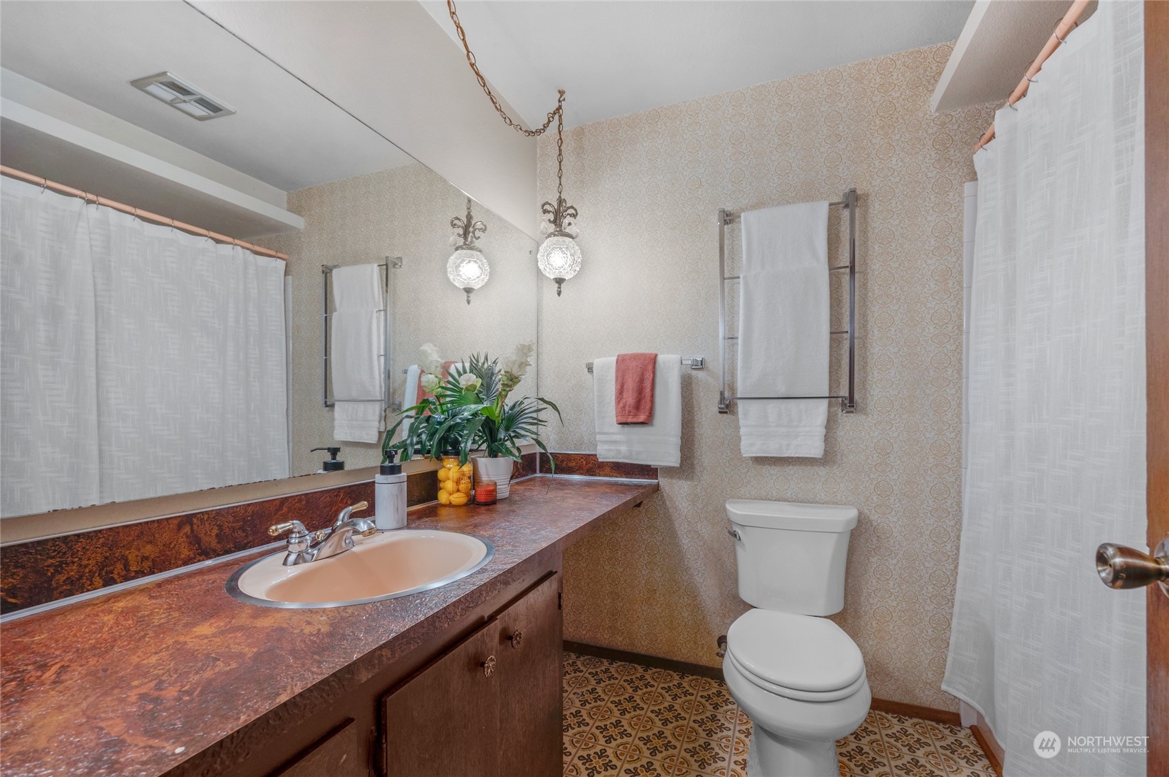 5616 227th Street Southeast Bothell, WA 98021 - Photo 28 of 38 a bathroom with a sink toilet and shower