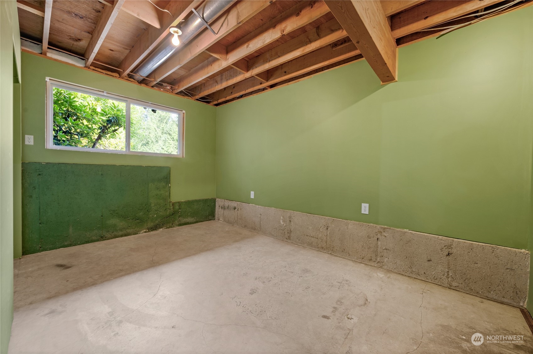 5616 227th Street Southeast Bothell, WA 98021 - Photo 35 of 38 a view of a room with a ceiling fan and window