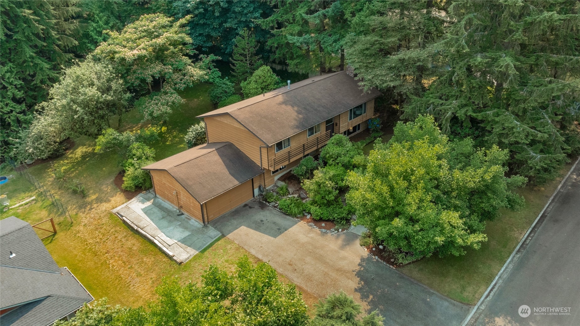 5616 227th Street Southeast Bothell, WA 98021 - Photo 5 of 38 an aerial view of a house with a yard
