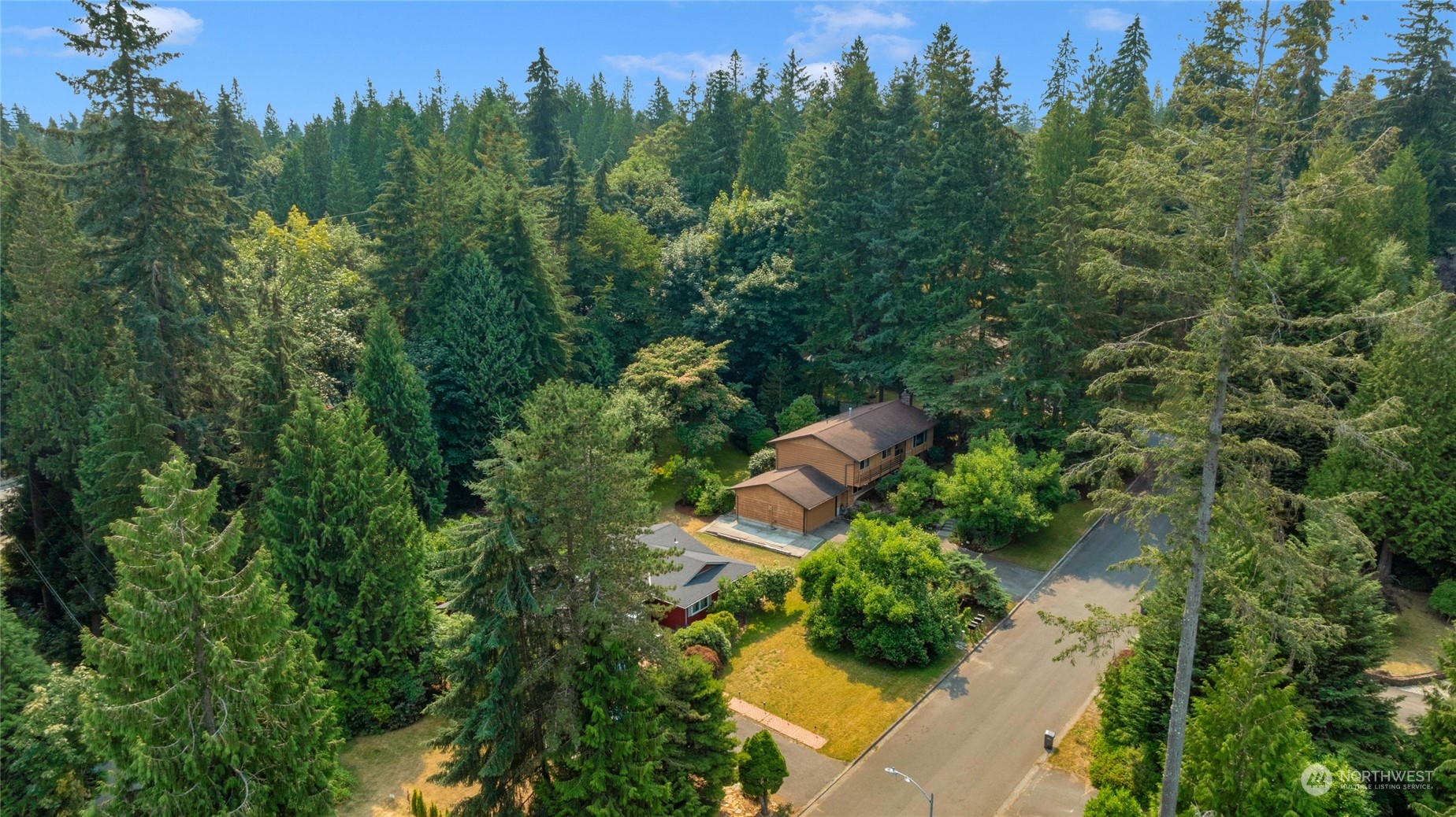 5616 227th Street Southeast Bothell, WA 98021 - Photo 7 of 38 an aerial view of a house with mountain view