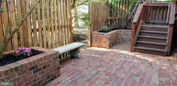 a view of balcony with wooden floor