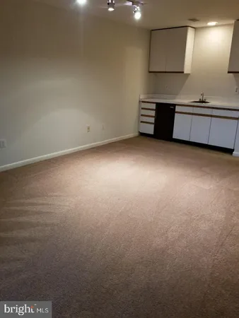 a view of a kitchen with a sink