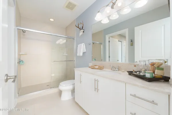a close view of a utility room with washer and dryer