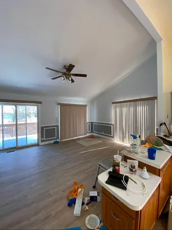a room with furniture and a wooden floor