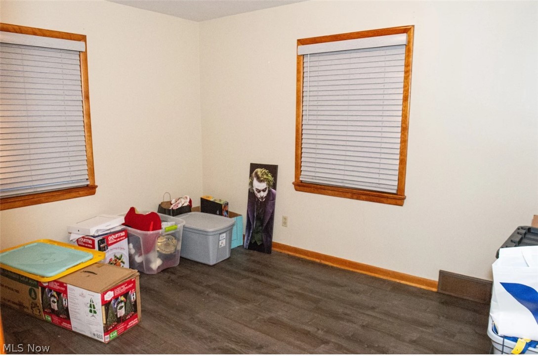6714 Trenholm Road Youngstown, OH 44512 - Photo 8 of 22 Recreation room featuring dark hardwood / wood-style floors