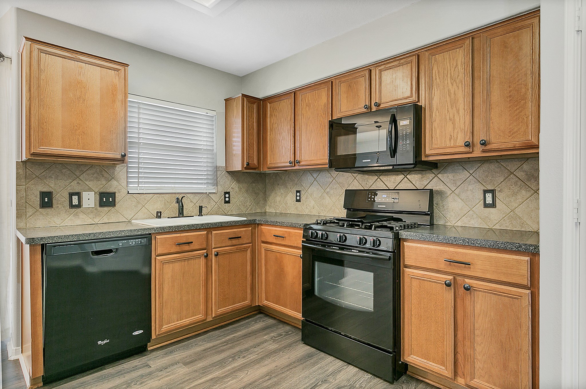 2331 Old Ox Road Spring, TX 77386 - Photo 6 of 16 Beautiful backsplash and appliances