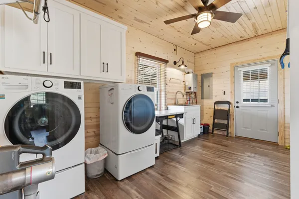 a view of a kitchen with washer and dryer